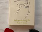 01 Guitar Capo/ 03 Picks/ Pick Holder Special Combo Pack