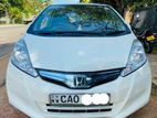 12% අඩුම පොලීයට ඔබේ වාහනයට 80% උපරිම ලීසිං - HONDA FIT GP1 2012/2013