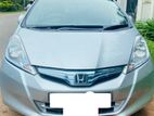 12.5% අඩුම වාරිකයට 80% උපරිම ලීසිං - HONDA FIT GP1 2012/2013