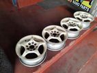 13" Multi stud alloy wheel set