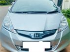 14% සුවිශේෂී අඩුම වාරිකයට 80% ලීසිං - Honda Fit Gp1 2013
