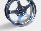 15X7 4X100 HYPER BLACK MACHINE LIP ALLOY WHEEL
