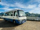 22/27 SeaterToyota Coaster Bus for Hire with driver