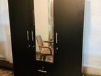 3 Door Black Melamine Wardrobes with mirror .