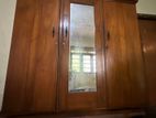 3 door teak cupboard