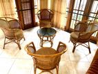 4 Rattan Chairs with A Glass Table