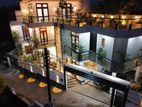 A ARCHITECT DESIGNED THREE STORY LUXURY HOUSE WITH FURNITURE