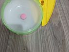 A Hamster Wheel and Bottle