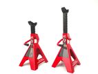 A Pair of 2 Ton Torin Big Red jack stands tassel stand car