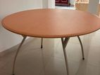 A Steel Table with 4 Cushion Chairs