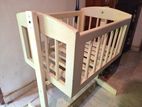 A Wooden Baby Cot