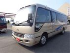 AC mini bus for hire and tours coaster rosa