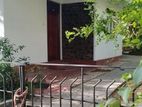 An Old Red Cement Separet House With Stair's, Rent In Hokandara Road,