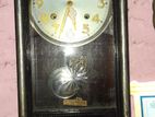 Antique HiBiNo Clock