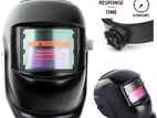 Auto dark welding helmet