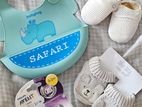 Baby shoes, pacifier bib bundle