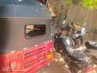 Bajaj RE red 2019