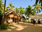 Beach Property with 8 Chalets/Rooms For Sale