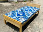 Bed and single layer mattrees