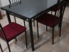 Black Glass Top Steel Table with 4 Chairs