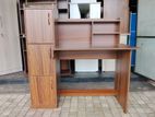 Brown colour melamine office table .