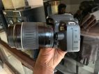 canon 100D DSLR with lens