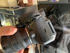 canon 60D DSLR body with lens