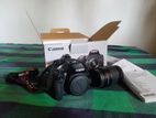 Canon EOS 250D DSLR Camera with zoom lense