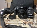 Canon EOS Rebel T7 Kit with 1855mm and 75300mm Lenses Shoulder Bag