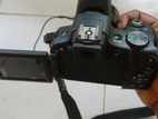 Canon PowerShot SX50 HS 50x Zoom Camera - Battery with Charger Included