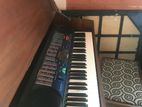 Casio Keyboard with Wooden Stand