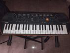 Casio SA-76 Mini Keyboard With Adjustable X-Stand Power Adapter