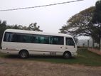 Coaster AC bus for hire