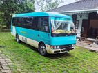 Coaster Rosa bus for hire 22-27 Seater