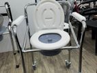 Commode chair with wheel