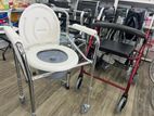 Commode chair with wheel