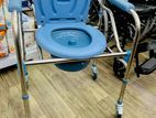Commode chair with wheel