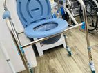 Commode chair with wheel