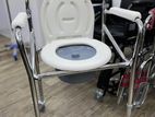Commode chair with wheel