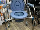 Commode chair with wheel