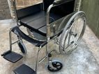 Wheel chair with commode
