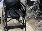 Commode wheelchair black with safety belt