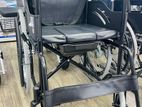 Commode wheelchair black with safety belt