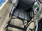 Commode wheelchair black with safety belt