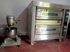Industrial oven with mixer