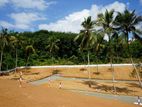 දංඕවිටින් නුවර පාරට ළගම ඉඩමක් - SE 09
