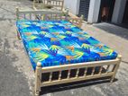 Double bed with layer mattresses. 72×48 inches