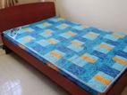 Double bed with mattress is for sale- DAMRO