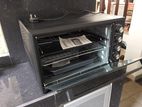 Electric Oven - a Milex 65 Litre 2000 W 6 to 7 Kg Almost New