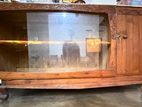 Elegant Carved Wooden Display Cabinet with Glass Sliding Doors